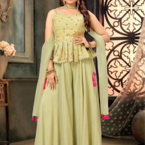Elegant Green Ethnic Outfit with Pink Tassels for Festive Vibes